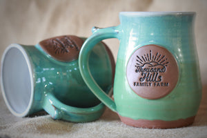 Open image in slideshow, NEW logo Thousand Hills Family Farm Ceramic Mug
